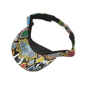Close-up of colorful snakeskin print texture on the visor of this outdoor sun hat