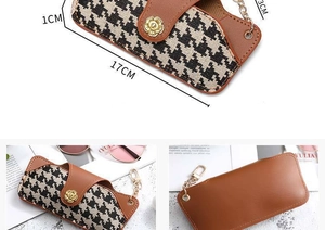 Detail showing dimensions of houndstooth and brown leather sunglass pouch with chain handle
