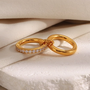Macro view of double-layer 18K gold plated ring with micro-pave cubic zirconia inlay