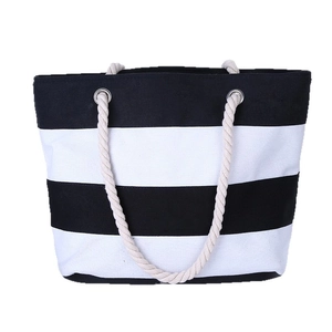 Minimalist canvas tote bag with black and white stripes and thick hemp rope handles