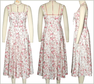 Three-way view of white midi dress with pink rose floral print and thin straps