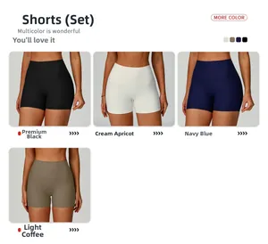 Macro detail of high-waist ribbed yoga shorts in black, navy, and khaki colors
