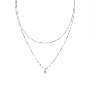 Detail of silver double-layered necklace with O-chain and zircon pendant