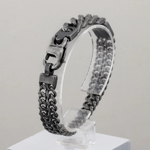 Detailed close-up of retro industrial double-row stainless steel chain bracelet for men