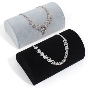 Gray and black velvet half-round jewelry display stands for necklaces and bracelets