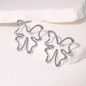 Minimalist 304 stainless steel butterfly stud earrings with irregular wave silhouette