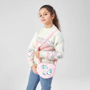 Detail of pink plush unicorn crossbody bag with soft texture and adjustable strap