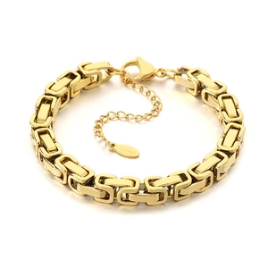 Golden stainless steel Byzantine chain bracelet with adjustable clasp on white background