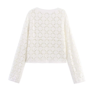 White crochet knit long sleeve top with floral hollow out lace pattern in retro style
