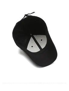 Detail shot of black baseball cap interior with white breathable lining and metal buckle