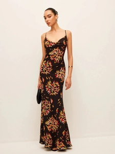 Detail view of the floral print pattern and chiffon fabric texture on the long camisole dress