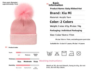 Size chart for striped baby knit hat with 13cm pompom showing S and M dimensions