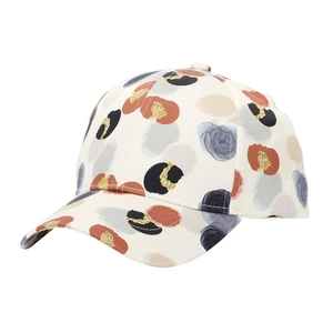 Close-up of floral baseball cap with leopard print texture and gold glitter accents