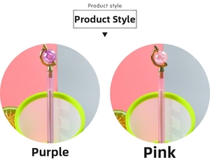 Detail of creative globe-shaped neutral pens in purple and pink with crystal globes