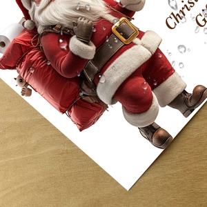 Détail d'un autocollant mural Père Noël avec sac de cadeaux rouge sur une surface en bois