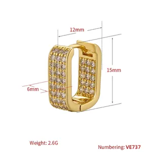 Minimalist gold huggie hoop earrings with micro-paved cubic zirconia stones