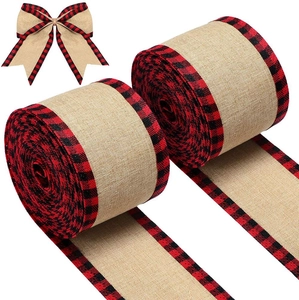 Linen Christmas ribbon rolls with red and black plaid edges and decorative bow accent
