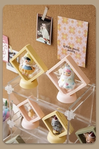 Macro detail of colorful PE film floating display boxes for jewelry on a stylish shelf
