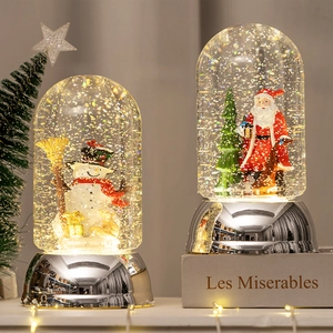 Lighted Christmas snow globe lantern with Santa and Snowman on silver mirror bases