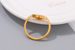 Detail view showing the golden stainless steel ring profile and polished texture