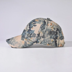 Classic Chinese style baseball cap with botanical floral print in soft beige and green