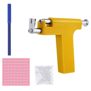 Professional ear piercing kit with yellow gun, marker pen, silver studs and ear plugs