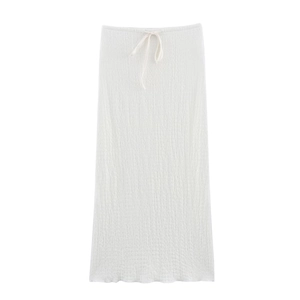 Elegant white textured maxi skirt with drawstring waist and seersucker fabric finish