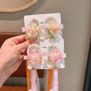 Traditional Chinese flower hair clips for girls with silk tassels and pearl accents