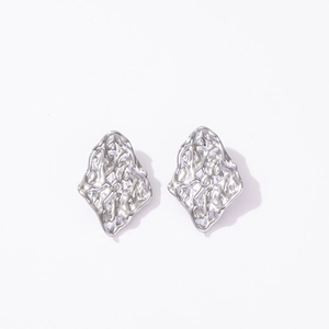 Lava texture silver titanium steel earrings with irregular geometric water drop design