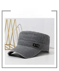 Close-up of charcoal grey canvas army cap featuring metal SPORT label and washed texture