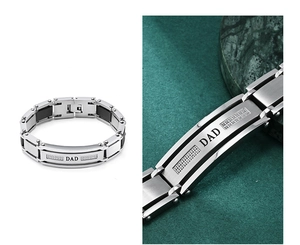 Detail view of a men's silver stainless steel DAD bracelet with black inlay and cubic zirconia