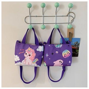 Detail of purple cartoon unicorn tote bags with adjustable shoulder straps for kids