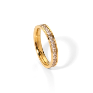 Minimalist gold titanium ring with circular pavé diamonds shown from a side view