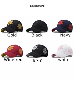 Color display of six embroidered cotton baseball caps with 3D letters and side text
