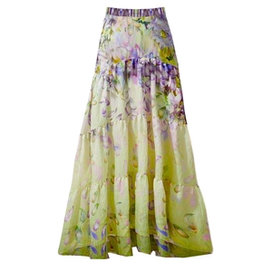Detail of high-waisted floral tiered maxi skirt with pale yellow oil painting print