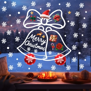 Cozy window display with Merry Christmas bell decals, snowflakes, and festive reindeer stickers