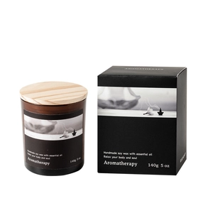 Aromatherapy soy wax candle in brown glass jar with wooden lid and black gift box