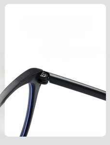 Macro shot of durable metal hinge on black cat-eye glasses frame for smooth opening