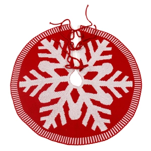 Red and white knitted Christmas tree skirt featuring classic large snowflake patterns