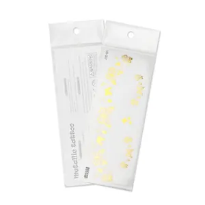 Golden metallic butterfly temporary tattoo stickers in retail packaging for festivals