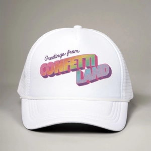 White trucker hat with colorful Confetti Land print and decorative white rope accent