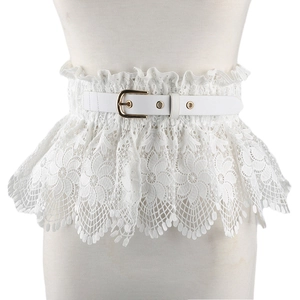 Macro detail of white floral lace corset belt with thin leather strap and gold buckle