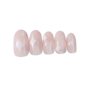 Nude pink press-on nails with white star patterns on a clean minimalist background