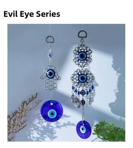 Detailed Turkish evil eye wall hangings with hamsa hand and blue glass amulets