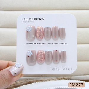 Handmade light blue cat-eye press-on nails with 3D floral accents and French tips