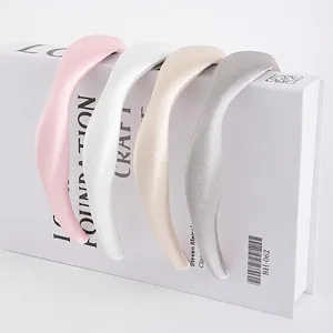 Retro padded leather headbands in pastel pink, white, cream, and silver grey finishes