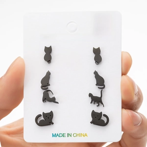 Set of 4 pairs of black stainless steel cat earrings in various playful poses