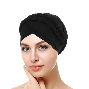 Detail of black turban headwrap featuring double braided milk silk fabric for women