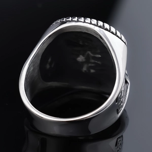 Vintage Viking style stainless steel ring with two-tone finish and Nordic relief detail