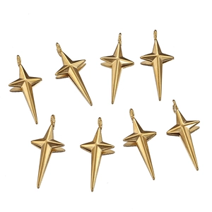 Eight 18k gold plated stainless steel star charms with polished metallic finish